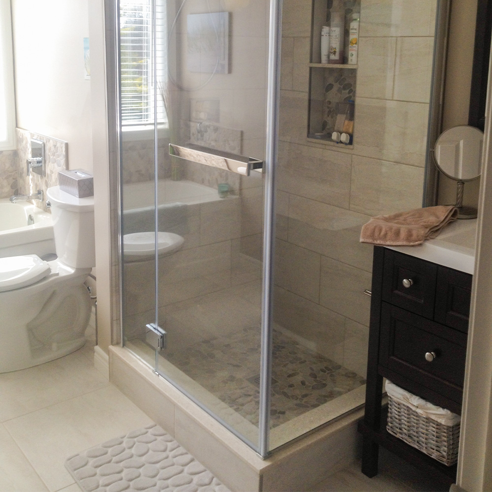 Custom main bath renovation with riverstone accent